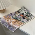 Detail of elegant tropical palm print scarf on a smooth wooden base with warm lamp light - Orange / 140*40cm
