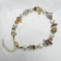 Armband met natuurlijke zoetwaterparels en kristallen met verstelbare gouden sluiting - Gestreepte Agaat