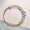 Double-layer 14K gold plated coil bracelet with grey cat eye beads and white pearls - White Cat's Eye Style