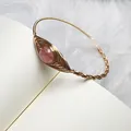 Handmade strawberry crystal evil eye bangle with 14K gold wire wrapped weave design - Strawberry Quartz Evil Eye Bangle
