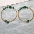 14K gold-wrapped wire bracelet featuring green agate beads in a dual coil design - Green Agate Style