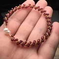 Handmade garnet bracelet with 14K gold-filled wire wrap and elegant pearl accents - Handmade Wire Wrapped Pearl Style / Garnet Red
