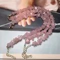 Multi-layer pink crystal chips bracelet with adjustable gold lobster clasp on magazine - Rose Quartz