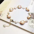 Detail of freshwater pearl bracelet with 14K gold-filled wire wrap and lobster clasp - White Pearl