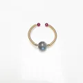 Handmade 14K gold wire wrapped ring featuring Labradorite crystal and purple accent beads - Labradorite