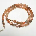 Polished sunstone beaded necklace with irregular pebble stones and gold lobster clasp - Rainbow Moonstone