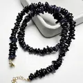Polished blue goldstone chip necklace with shimmering mineral beads and golden clasp - Blue Sandstone