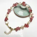 Detail of baroque pearl bracelet with strawberry quartz beads and gold lobster clasp - Strawberry Quartz and Baroque Freshwater Pearl