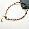 Vue détaillée du bracelet en perles de tourmaline facettées avec fermoir mousqueton doré - Bracelet Perles Standard