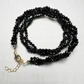 Choker necklace featuring 3mm black faceted spinel beads with adjustable gold clasp - Faceted Round Beads / Black