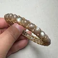 Handmade gold wire-wrapped sunstone bracelet with 14K gold accessories and energy crystal - Bright Gold Wrapped Gray Bead Style (Style 8)