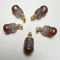 Pendentifs PiXiu Auralite 23 avec fermoirs couronne en S925 dorés sur tissu blanc - Pendentif Sculpté en Cristal Naturel Aurora 23/Super Seven (Style Aléatoire)
