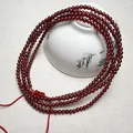 Garnet red beaded wrap bracelet with adjustable red cord in a zen ceramic bowl - Waist Chain 76CM Length 2.8MM Bead Diameter