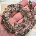 Detalle del collar de virutas de cuarzo rutilado negro natural con cierre dorado - Collar Turmalina Rutilada