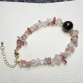 Detail of natural crystal chip bracelet with garnet bead and golden lobster clasp - Garden Quartz