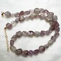 Dettaglio collana in ametista naturale irregolare con catenina regolabile placcata oro - Collana di Fantasma