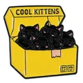 Cute enamel pin featuring four black cats in a yellow box labeled Cool Kittens - Yellow Cool Kittens Box Style (C3467-5)