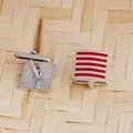 Square silver men's cufflinks with red stripes and T-bar closure on textured background - Red
