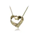 Detail of vintage bronze heart-shaped pendant featuring embossed tape measure markings - Antique Bronze