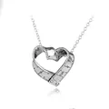 Macro detail of vintage heart tape measure pendant with textured metal finish - Antique Silver