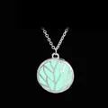 Glow in the dark Tree of Life necklace with mint green pendant on a silver chain - Green