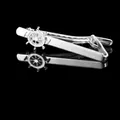 Close-up of silver necktie clip featuring a nautical ship wheel design with mirror reflection - Ship Wheel Tie Clip (T1007) / Silver