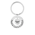 Silver stainless steel keychain with heart pendant and engraved inspirational teacher words - Silver Engraved Style (D1239)