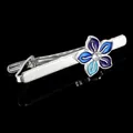 Macro detail of silver floral tie clip with blue purple enamel and sparkling zircon - Single Tie Clip / Blue Flower Tie Clip (T1022)