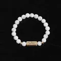 Boho marble stone beaded bracelet with golden vintage Love charm on dark background - White Marble (Love)