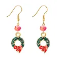 Christmas wreath earrings with green ring, red bow, and pink bead on golden hooks - F1157