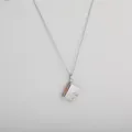 Silver book-shaped locket necklace with rose gold heart detail and secure clasp - Rose Gold