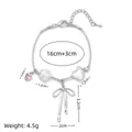 Süßes silbernes Schleifenarmband mit rosa Herzstein und Sternperlen für Damen - Schleife Stern Armband / Armband