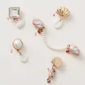 Detailed close-up of shell charms and pearls for clogs in elegant rose gold finish - Square Crystal Shell Piece Pendant