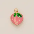 Pink enamel heart peach charm with green leaves and gold ring on a white background - Heart Peach