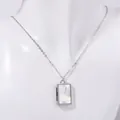 Silver rectangle stainless steel locket necklace with iridescent shell on white mannequin - Steel White Shell - Rectangle