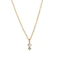 Macro detail of gold necklace featuring white pearl and blue zircon geometric pendant - March Necklace
