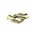 Detailed macro view of vintage gold-plated metal hands shaking brooch in handshake design - Bronze
