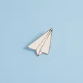 Detailed view of a minimalist white enamel paper plane brooch with silver alloy edges - White Enamel Style / White Airplane (C1108-5)