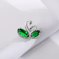 Elegant silver double swan brooch with emerald green crystals and micro-set zircons - Silver