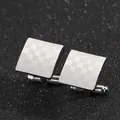 Polished silver square cufflinks with classic grid pattern shown on a dark background - Checkered Pattern (B1211)