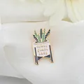 Cute enamel pin of a snake plant in a white pot with Crazy Plant Lady text design - Snake Plant (C1827-1)