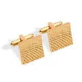 Square gold cufflinks with radial pyramid texture and classic T-shaped closure - Gold