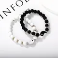 Yin Yang beaded bracelet set with black and white natural stones and gold metal spacers - Minimalist Embellished Tai Chi Beaded Style (G1250)