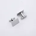 Close-up of polished silver cufflinks with secure bullet back closure for men's shirts - Rectangular Silver