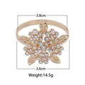 Golden snowflake napkin ring with clear rhinestones and dimensions 3.8cm diameter - Gold Flower Style (Z1037)
