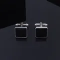 Minimalist square black cufflinks with silver metal frames on a reflective surface - Silver Square Style (B1331-1)