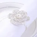 Silver flower napkin ring with rhinestones and pearl on a white fabric napkin - White Rhinestone