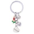 Metal keychain with uncle heart pendants and a decorative rose flower gift - Uncle