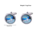 Detalle de gemelos redondos con el árbol de la vida celta y cristal artístico azul - Estilo Árbol De La Vida Plateado