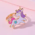 Bague licorne dorée ajustable pour enfants avec détails de cœur et fleur en émail coloré - Licorne Rose Violet (E1209-8)